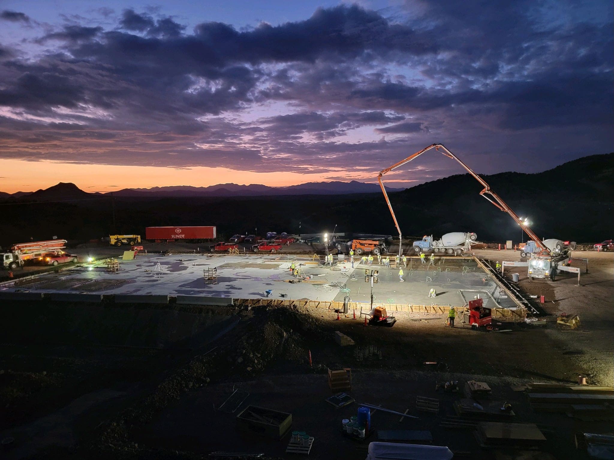 Sunset over the Hermosa Project site with concrete being poured.